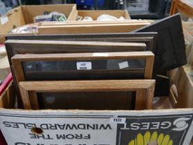 Box containing various picture frames