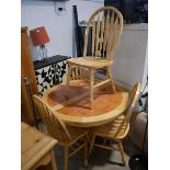 Round extending kitchen table with tile effect top plus 4 chairs