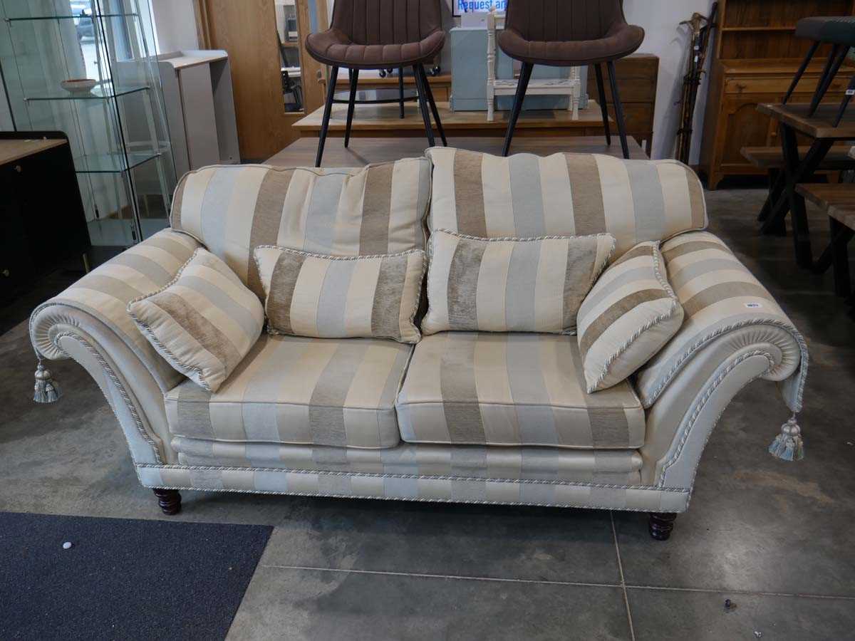 Two x 2 seater sofas in cream striped pattern