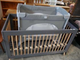 Large infant's cot together with a child's travel cot