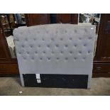 Light grey button back upholstered head board