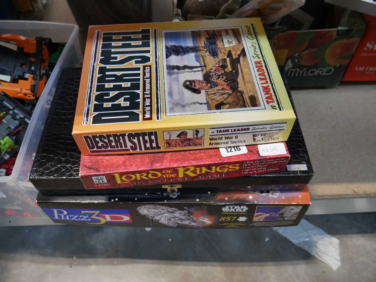 Small stack of various games to include Lord of the Ring Adventure Game, Desert Steel, Lock Stock
