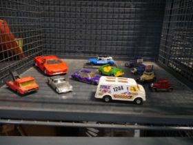 Cage containing various collectible cars by Dinky, Corgi, Matchbox etc.