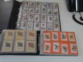 3 albums of cigarette/trade cards (mostly Silk cards) of military, flowers birds, flags, sport