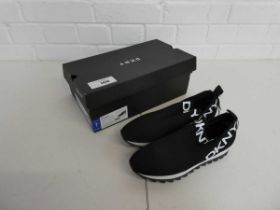 +VAT Boxed pair of ladies DKNY slip on trainers in black size 4.5