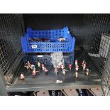 Cage containing a quantity battle style figurines