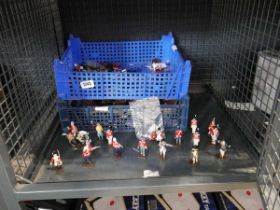 Cage containing a quantity battle style figurines