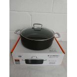 +VAT Le Creuset lidded sauteuse pan (28cm) in black, boxed