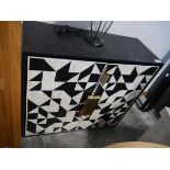 +VAT Modern black cupboard with black and ivory coloured mosaic door fronts and gilt handles