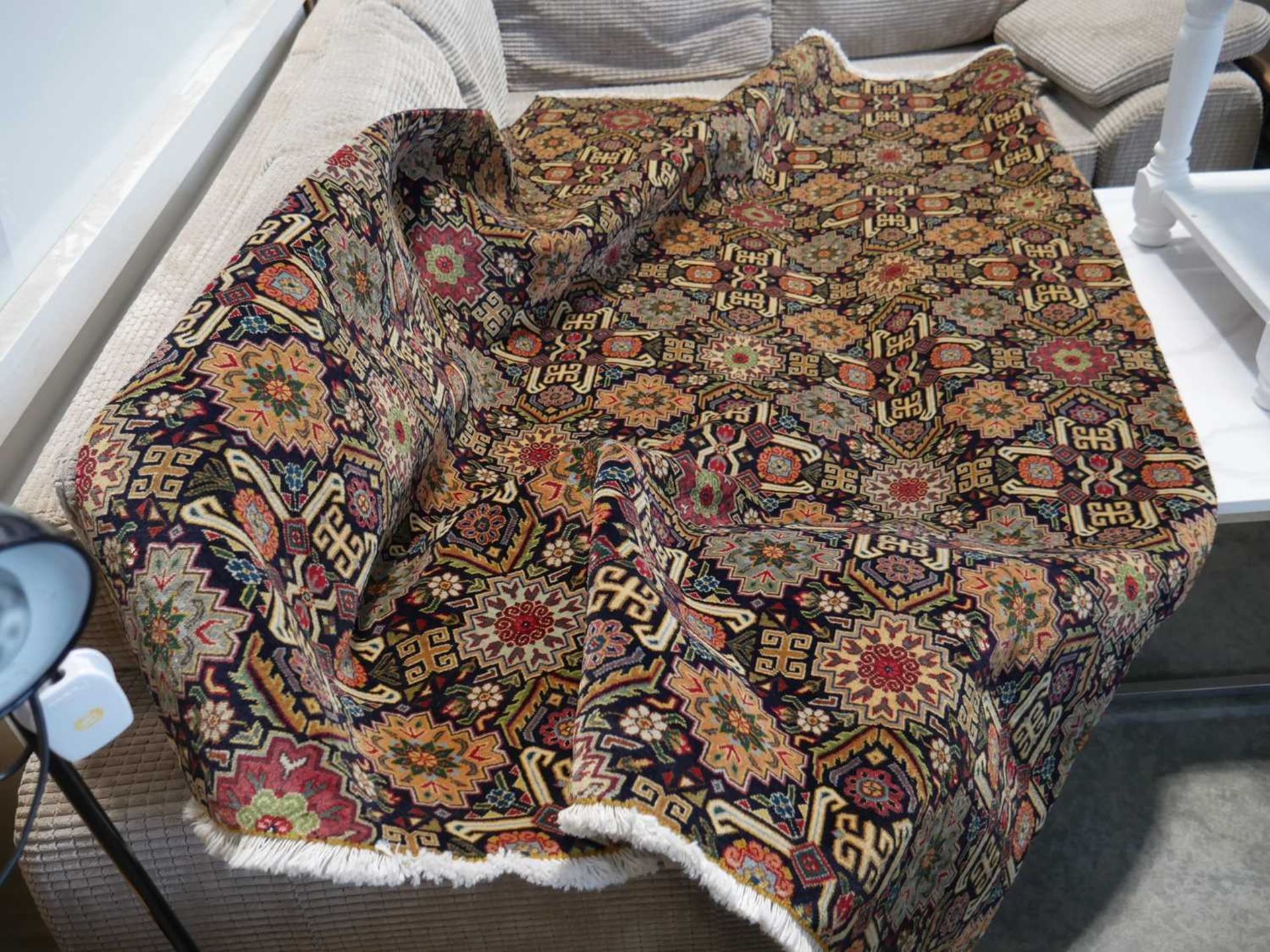 Hand made wool and silk Tabriz rug (228 x 143cm)