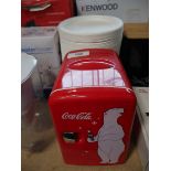 +VAT Large quantity of paper plates with unboxed Coca-Cola mini cooler