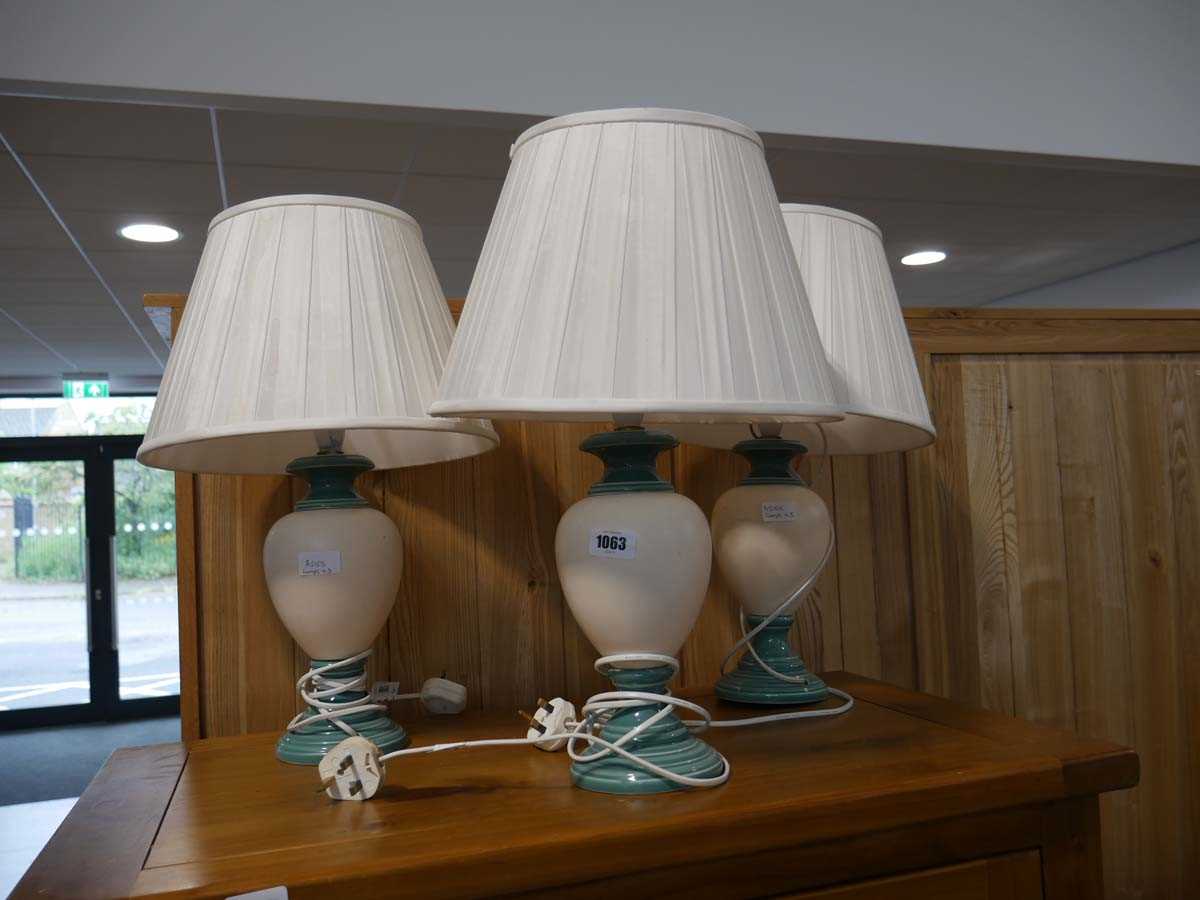3 matching table lamps with white/ ivory coloured shades