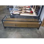 Metal framed entertainment stand with glass surface and 3 hardwood finish drawers below