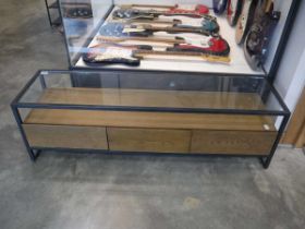 Metal framed entertainment stand with glass surface and 3 hardwood finish drawers below
