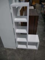 Small white shelving unit together with a white kallax style shelving unit