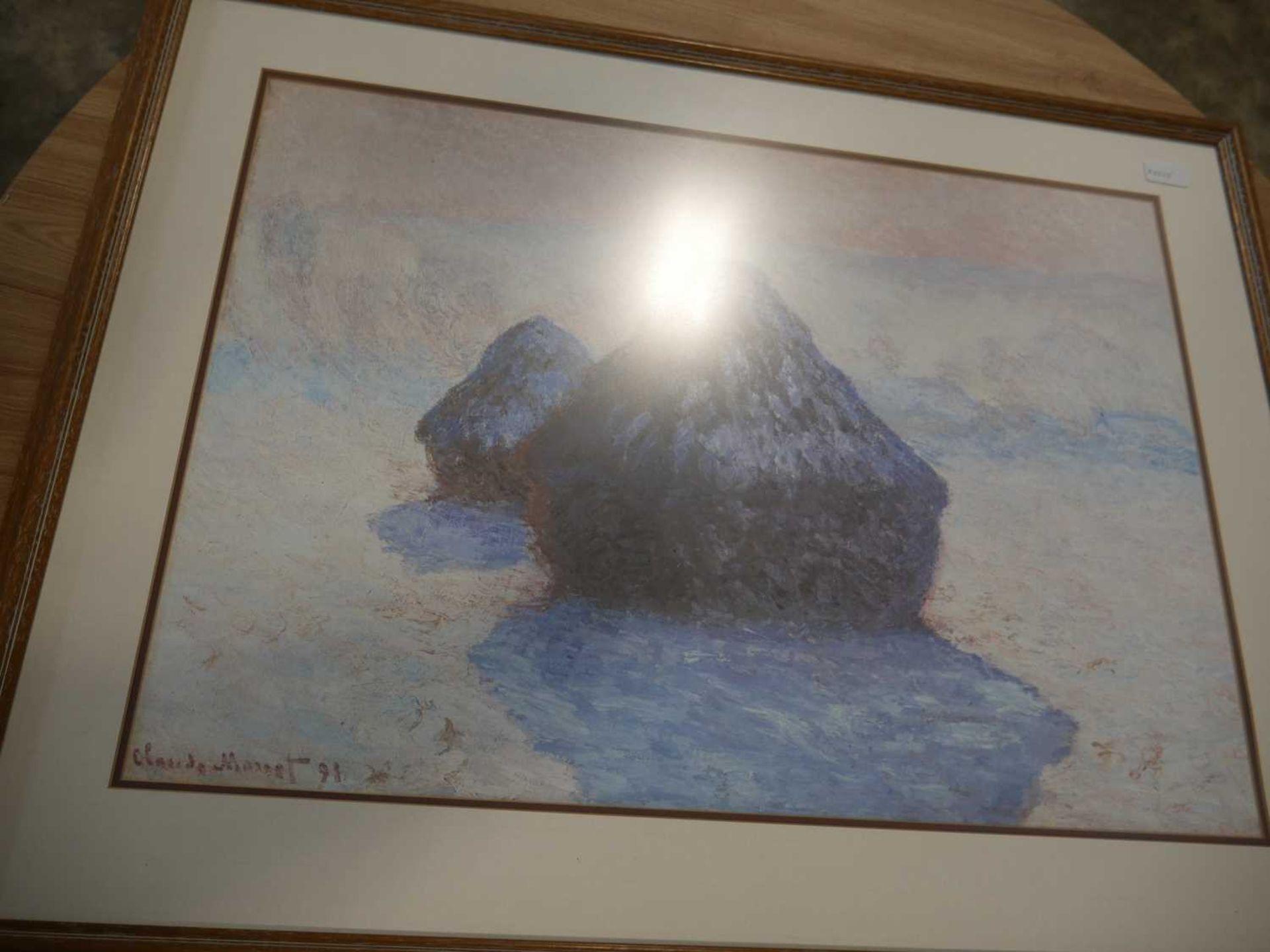 Framed print by Sego with a framed print by Monet