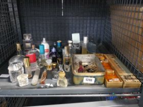 Cage containing perfume miniatures and bottles to include Diesel, Beckham, Ted Baker, Elizabeth