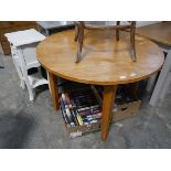 Circular wooden dining table