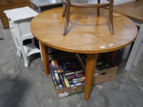 Circular wooden dining table