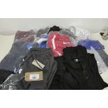 +VAT Mixed bag of adults clothing to include t shirts, trousers, shorts, shoes etc.