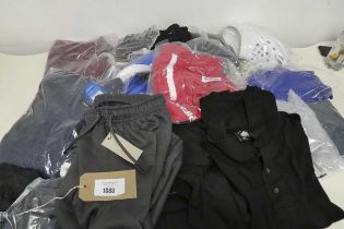 +VAT Mixed bag of adults clothing to include t shirts, trousers, shorts, shoes etc.