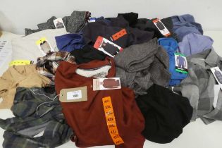 +VAT Approx. 20 items of mens and womens clothing to include t-shirts, jumpers, cardigans ect.