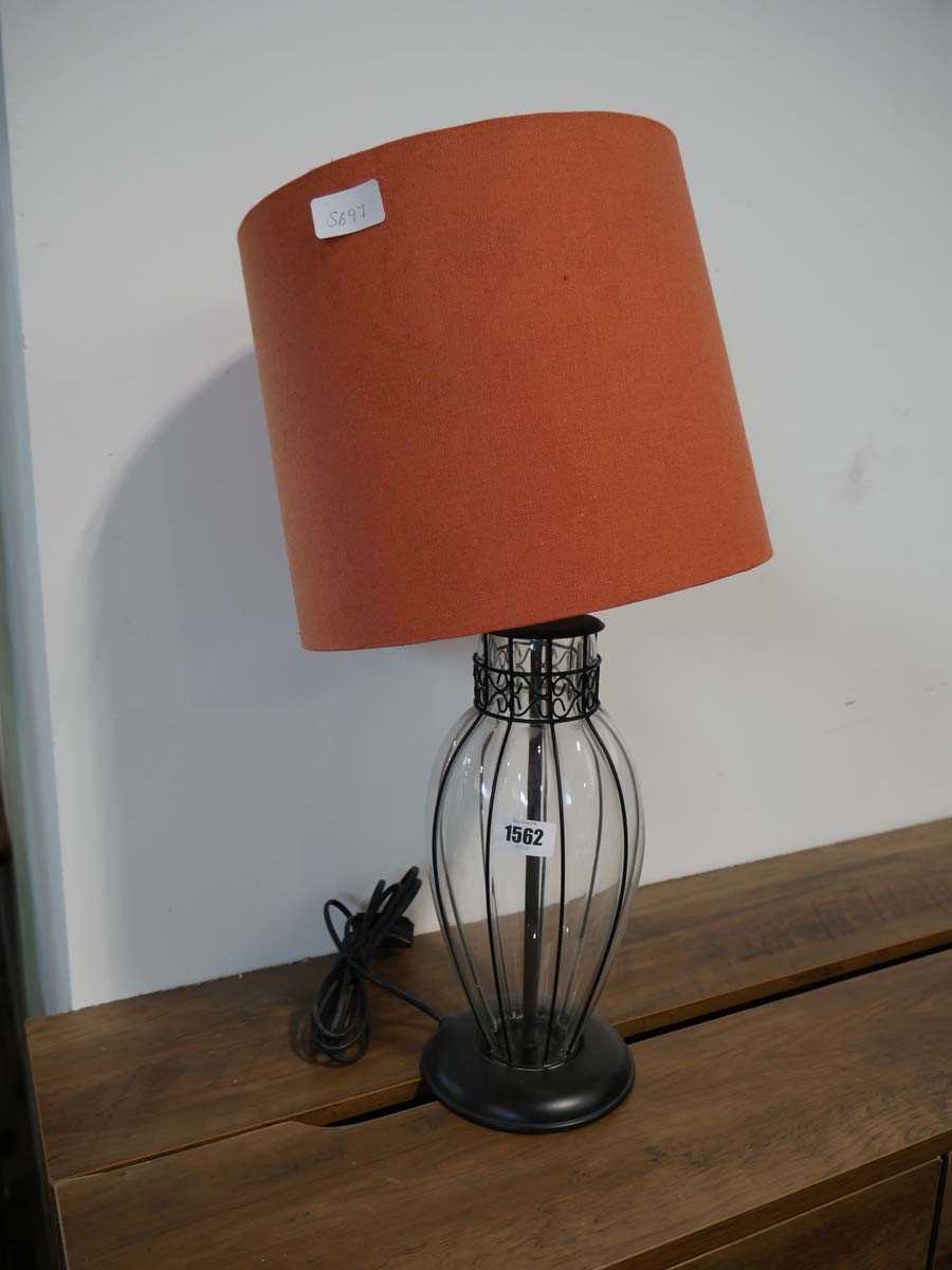 Glass effect lamp shade with orange shade