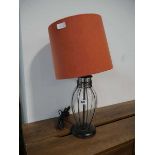 Glass effect lamp shade with orange shade