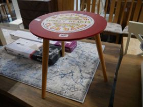 The Beatles inspired side table with markings in reference to Sergeant Pepper's Lonely Hearts Club