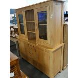 Large wooden wall unit with 4 drawers and 2 cupboards below, 2 glass cabinets above and 2 shelves