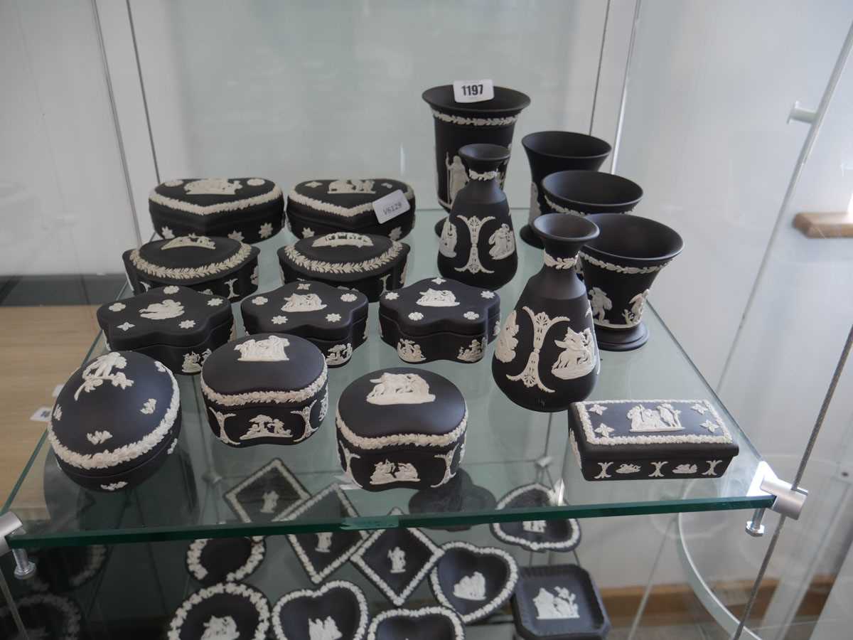 2 shelves comprising various black Wedgwood items