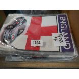 Stack of various England decorative magnets for cars