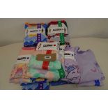 Bag of childrens of 4 piece pyjama sets by Kirkland.