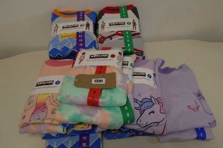 Bag of childrens of 4 piece pyjama sets by Kirkland.