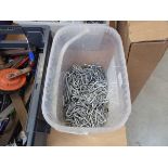 Tub containing U-shaped galvanized nails