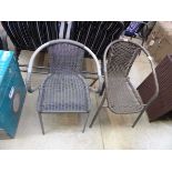 Near pair of grey rattan garden armchairs