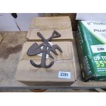 2 boxes containing approx. 16 cast iron fork and handle hooks