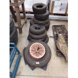 Large quantity of various size tyres, tubes and a wheel