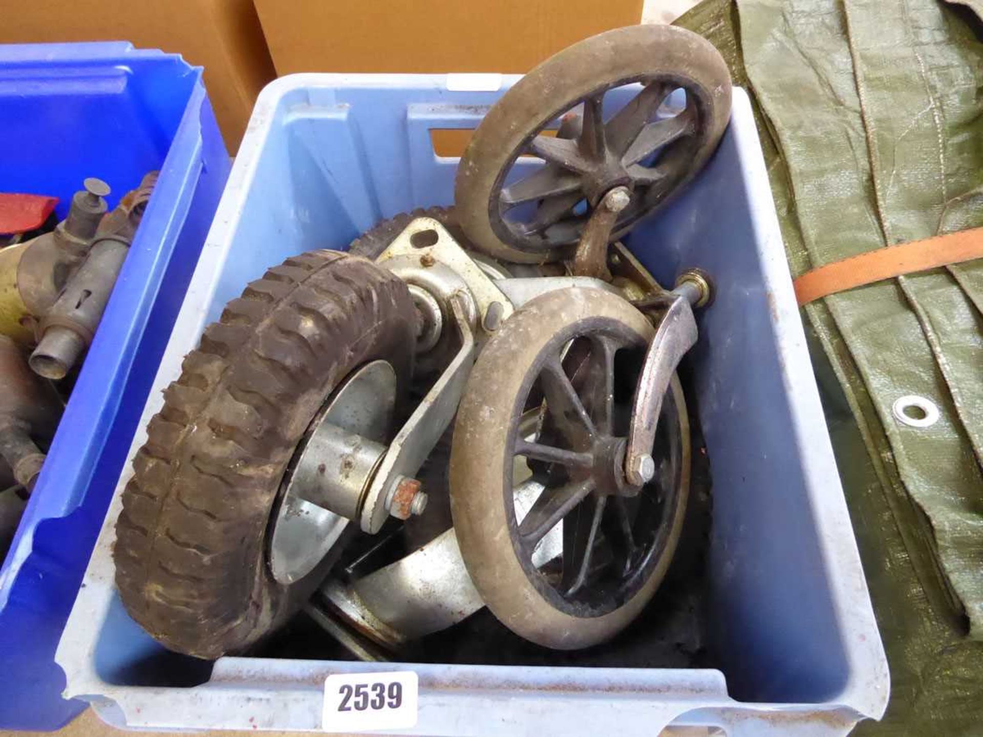 Crate of various sized castors and wheels