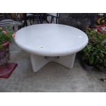 Modern circular stone style outdoor coffee table