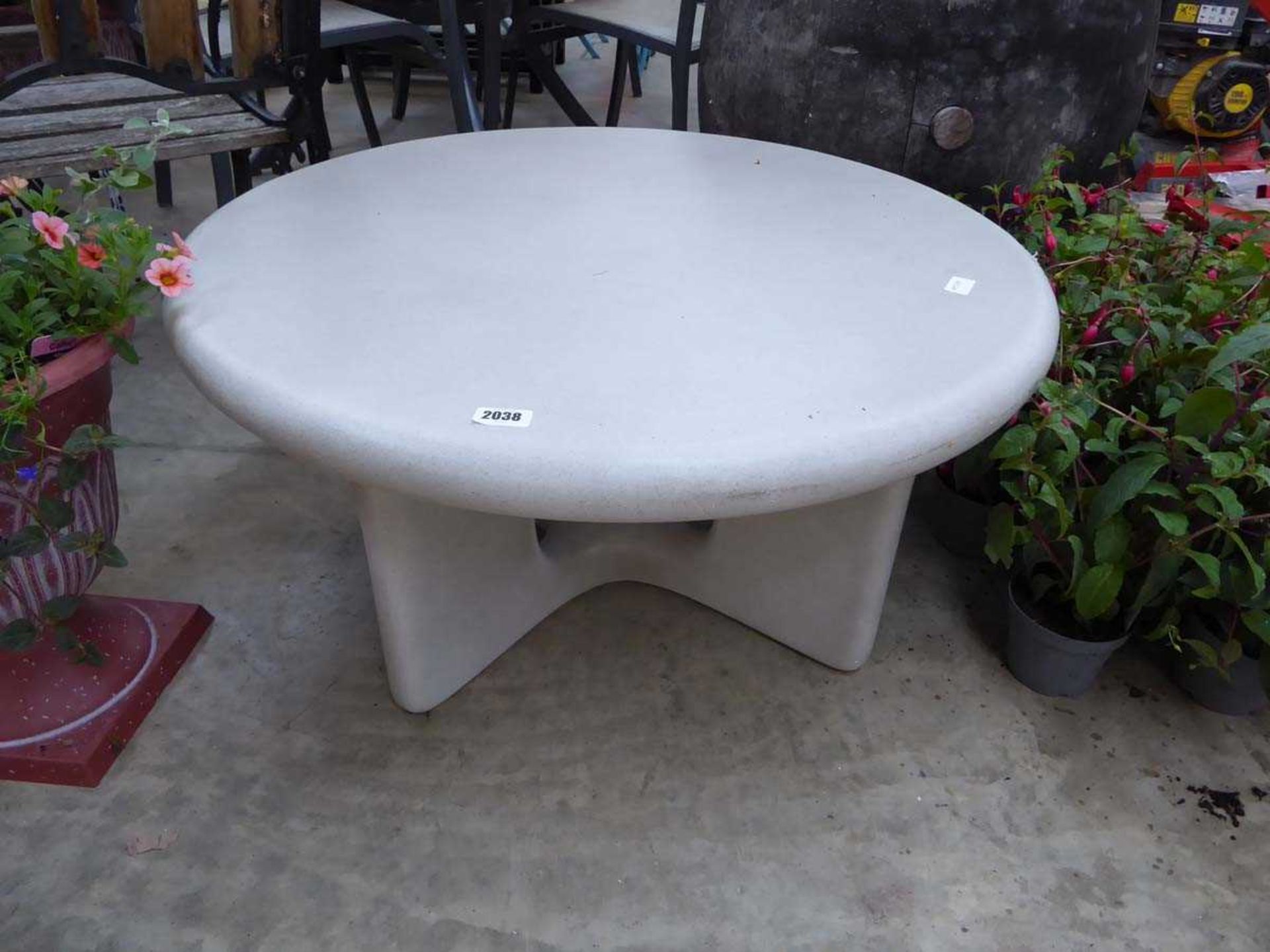 Modern circular stone style outdoor coffee table