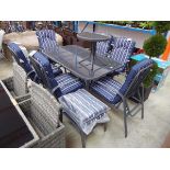 Grey aluminium 8 piece garden dining set comprising rectangular glass top dining table, 6 matching