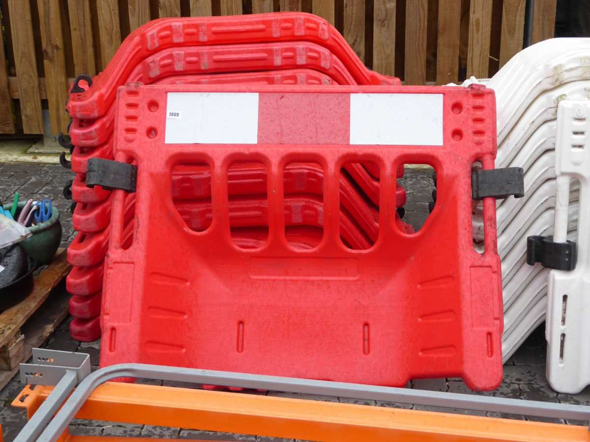 10 red work safety barriers