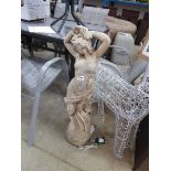 Decorative concrete figurine in the form of a lady