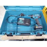 Cased Makita cordless drill with battery and charger