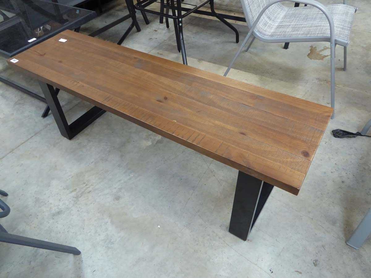 Modern composite garden bench on black yew supports