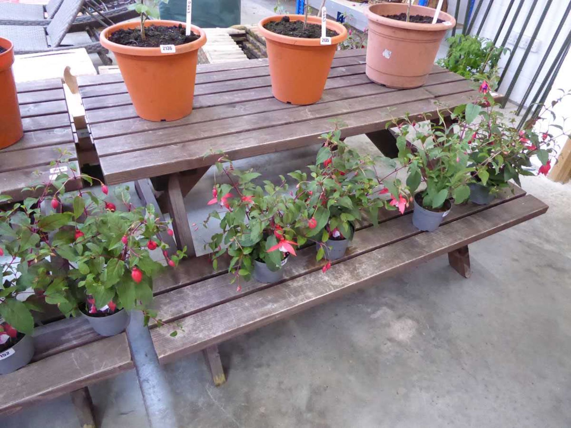 Wooden slatted picnic style bench