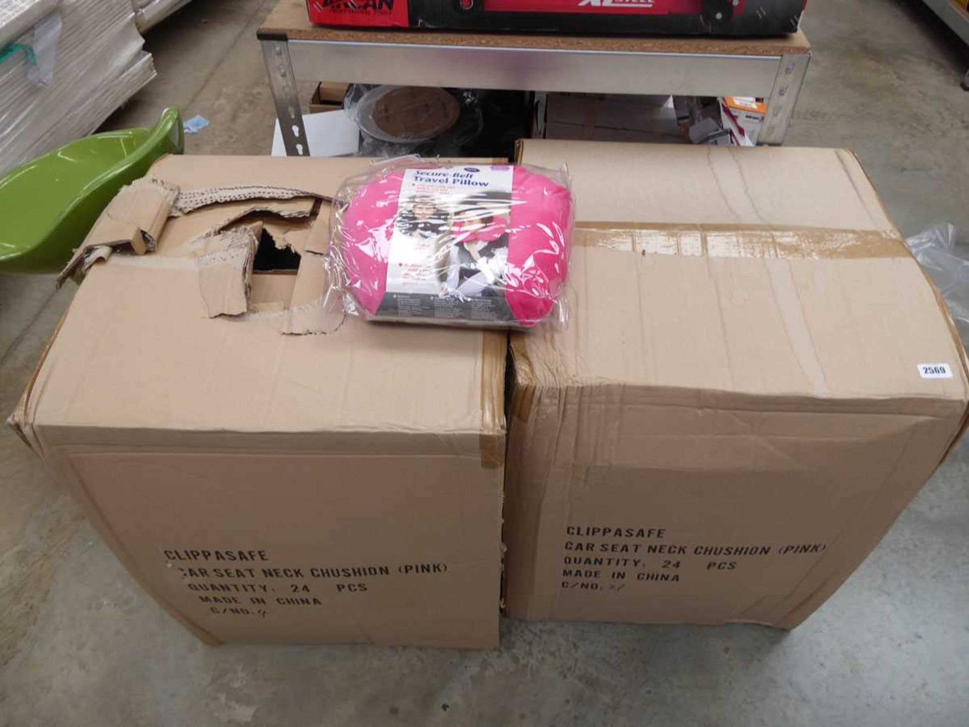 2 boxes containing approx. 24 piece each of pink car seat neck cushions