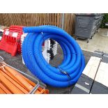 Large reel of blue hosing