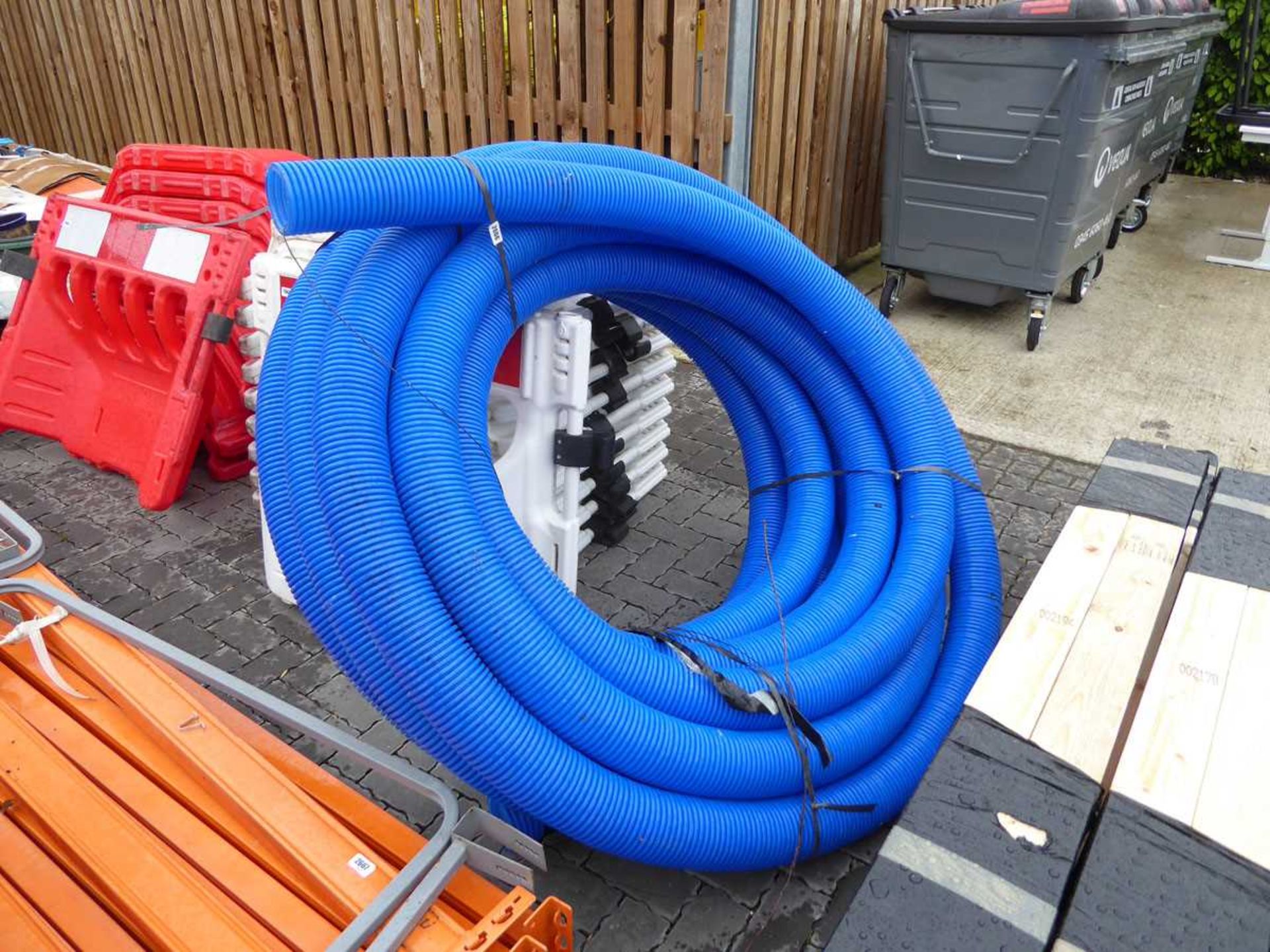 Large reel of blue hosing